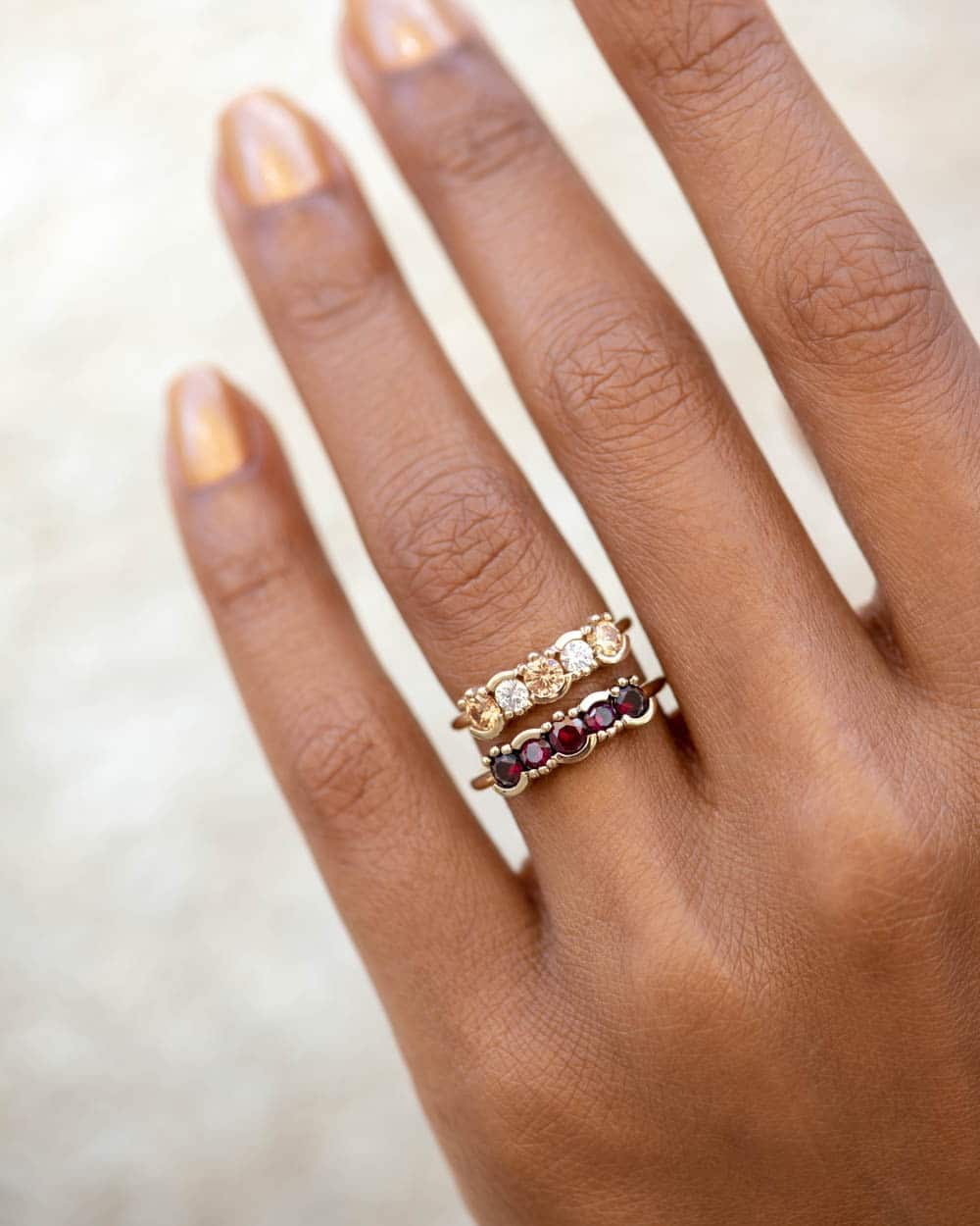 2018_10_4_on_figure_lash_linear_diamond_ombre_ring_lash_linear_garnet_ring_web_2.jpg