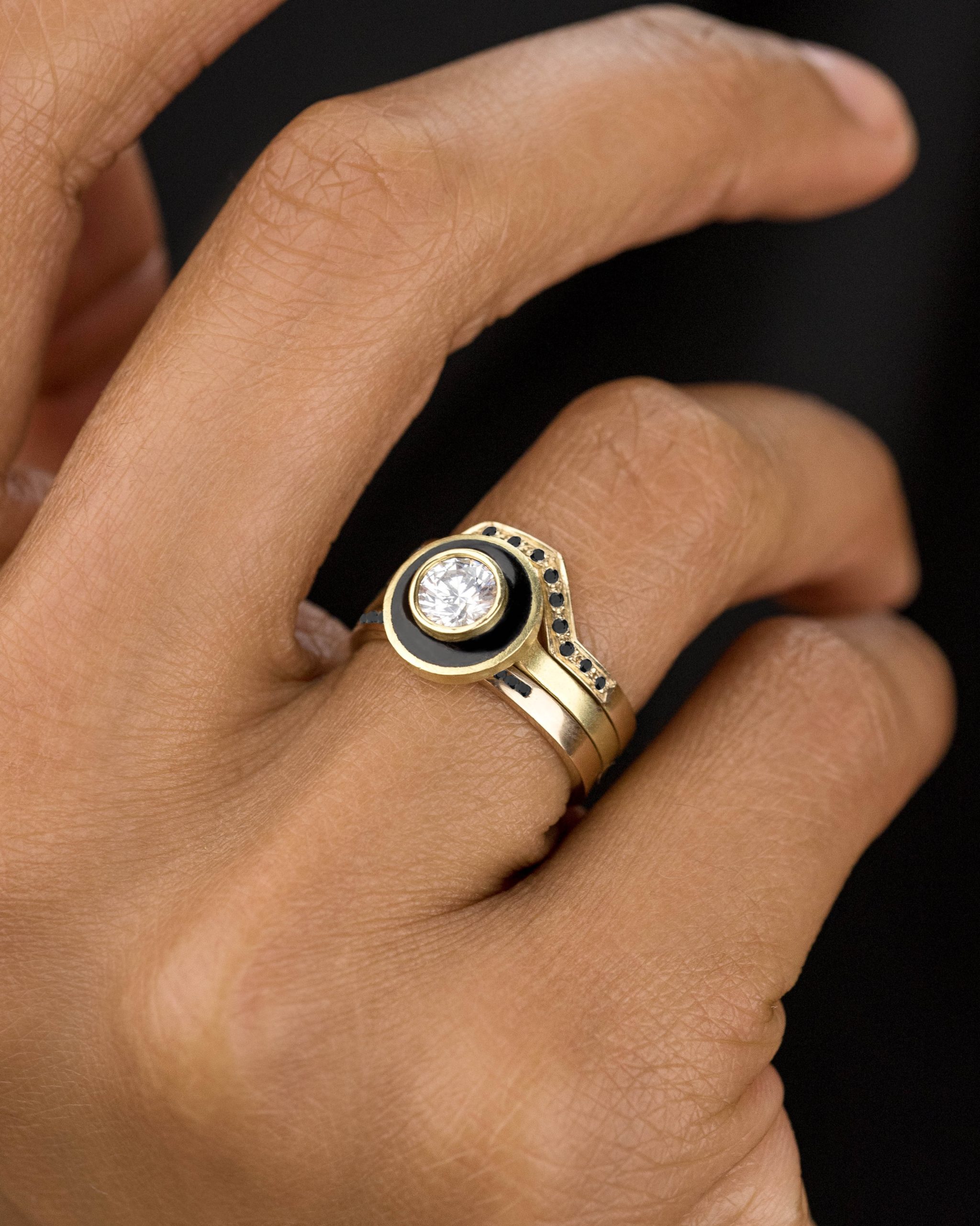 Senna Diamond Halo Ring with Black Enamel, Linea Black Diamond Band and Channel Black Diamond Narrow Band on figure
