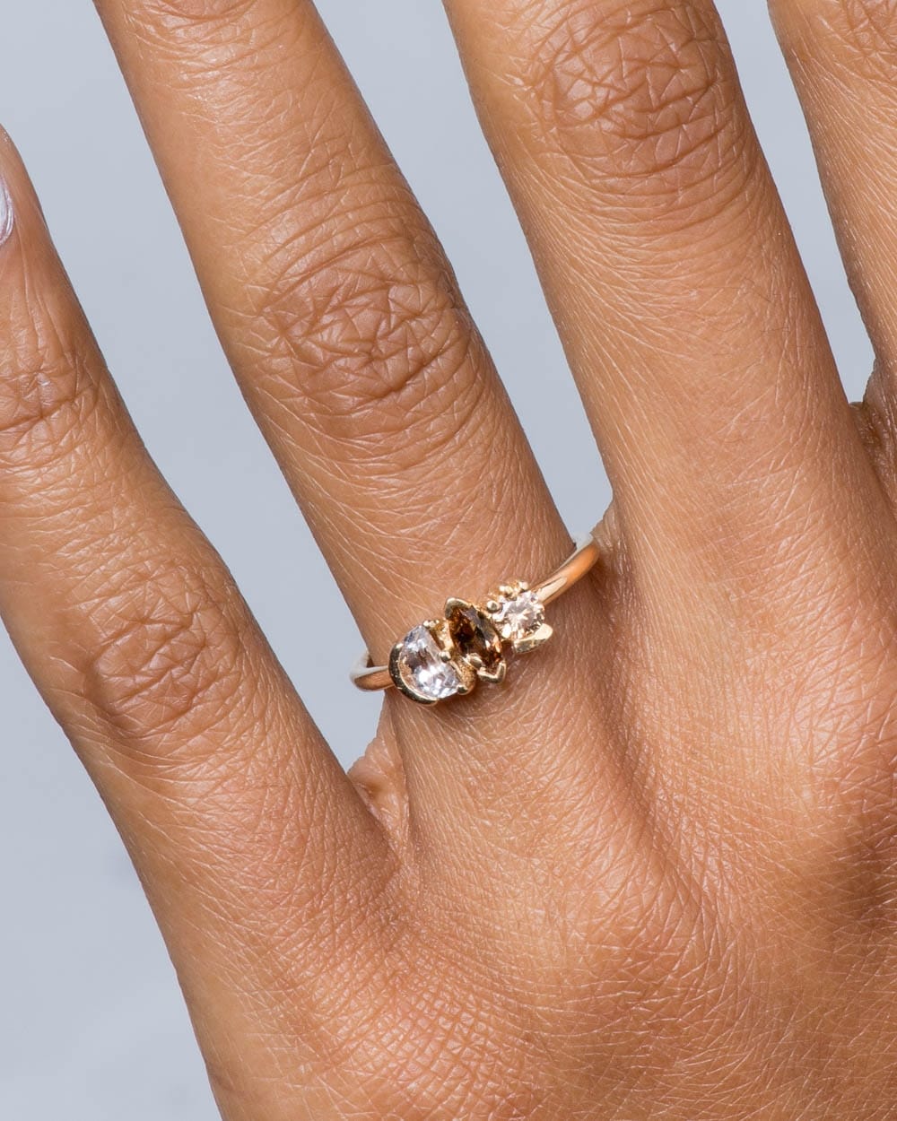 Lash Cluster Triad Andalusite Marquise Ring on figure