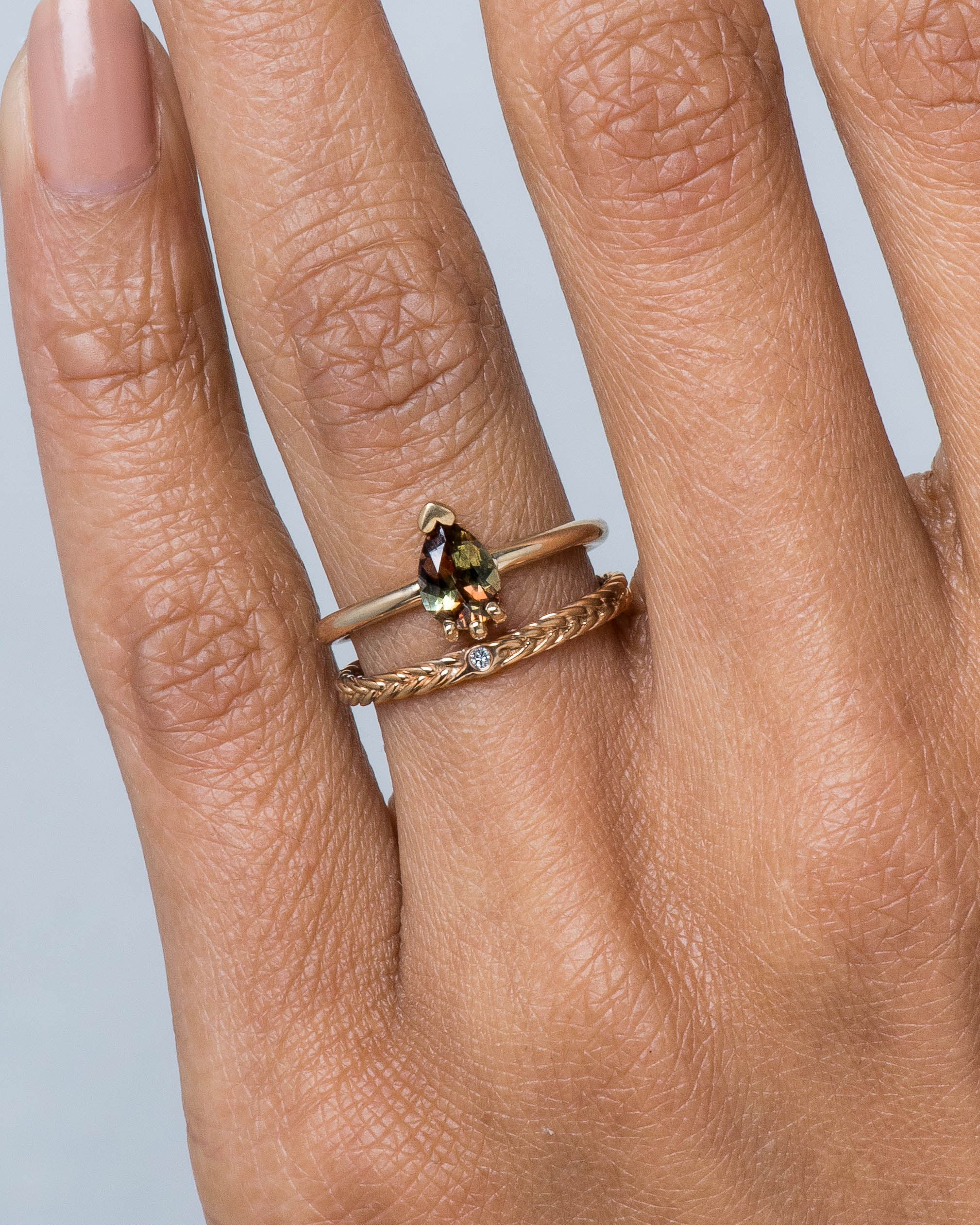 Lash Andalusite Pear Ring and Fishtail Diamond Band on figure
