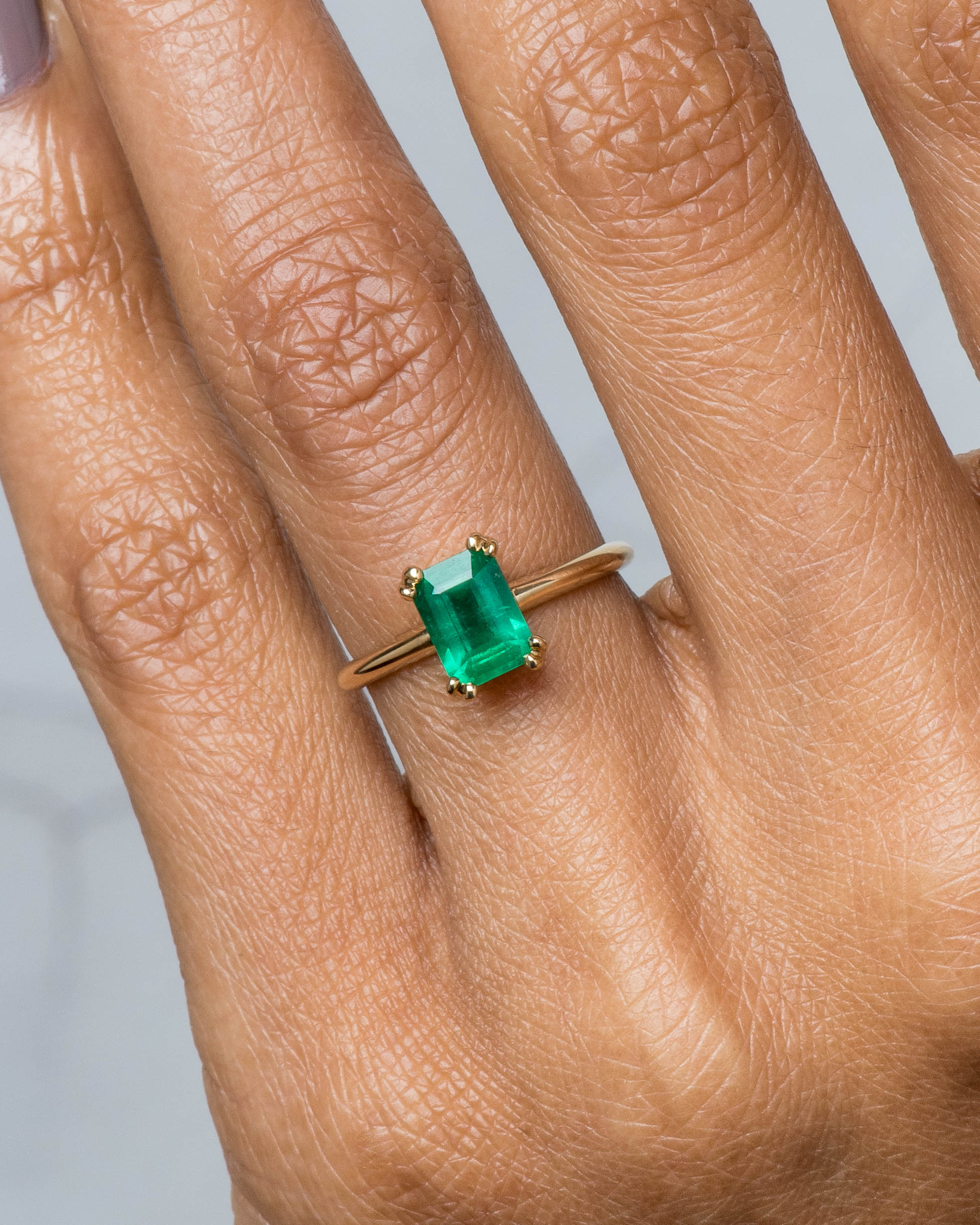 Ray Emerald Cut Ring on figure