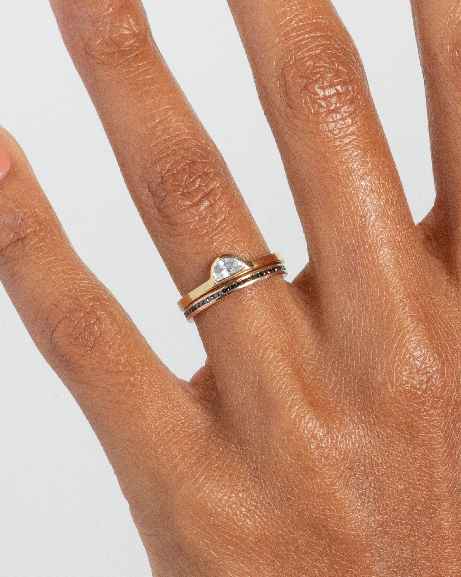 Half-Moon White Sapphire Ring with Channel Black Diamond Narrow Band on figure