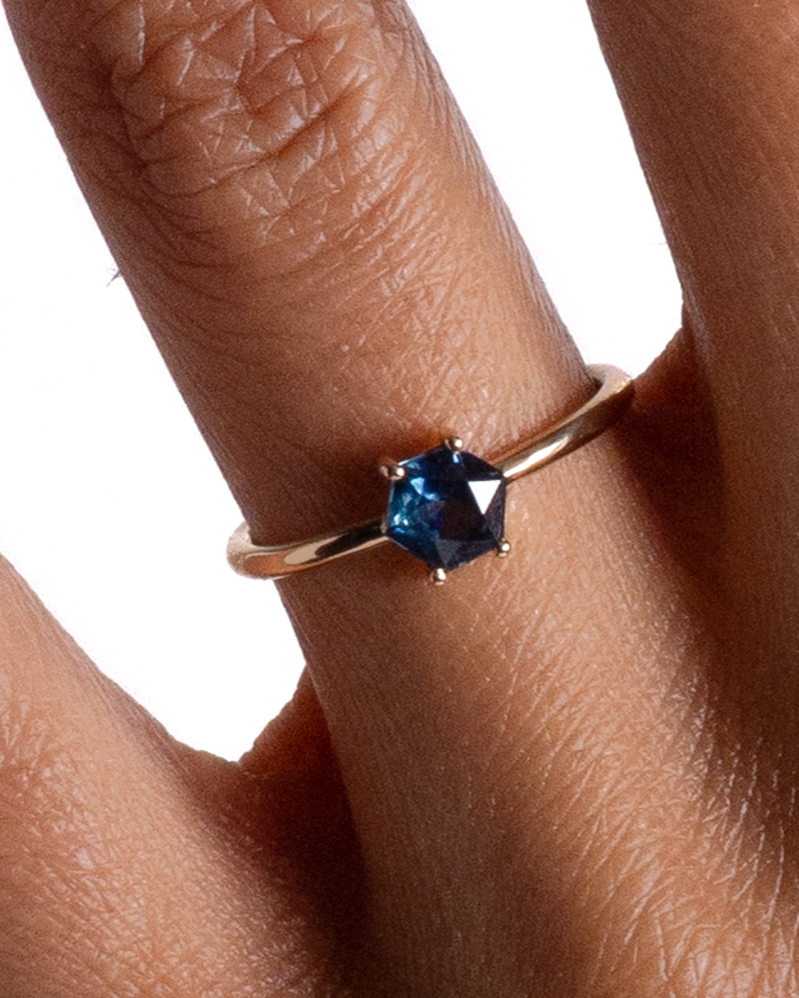 Kalmia Hex Blue Sapphire Ring on figure