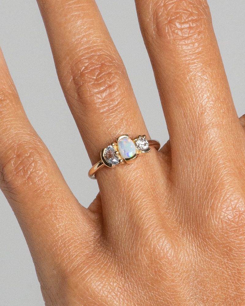 Lash Cluster Triad Opal Ring on figure