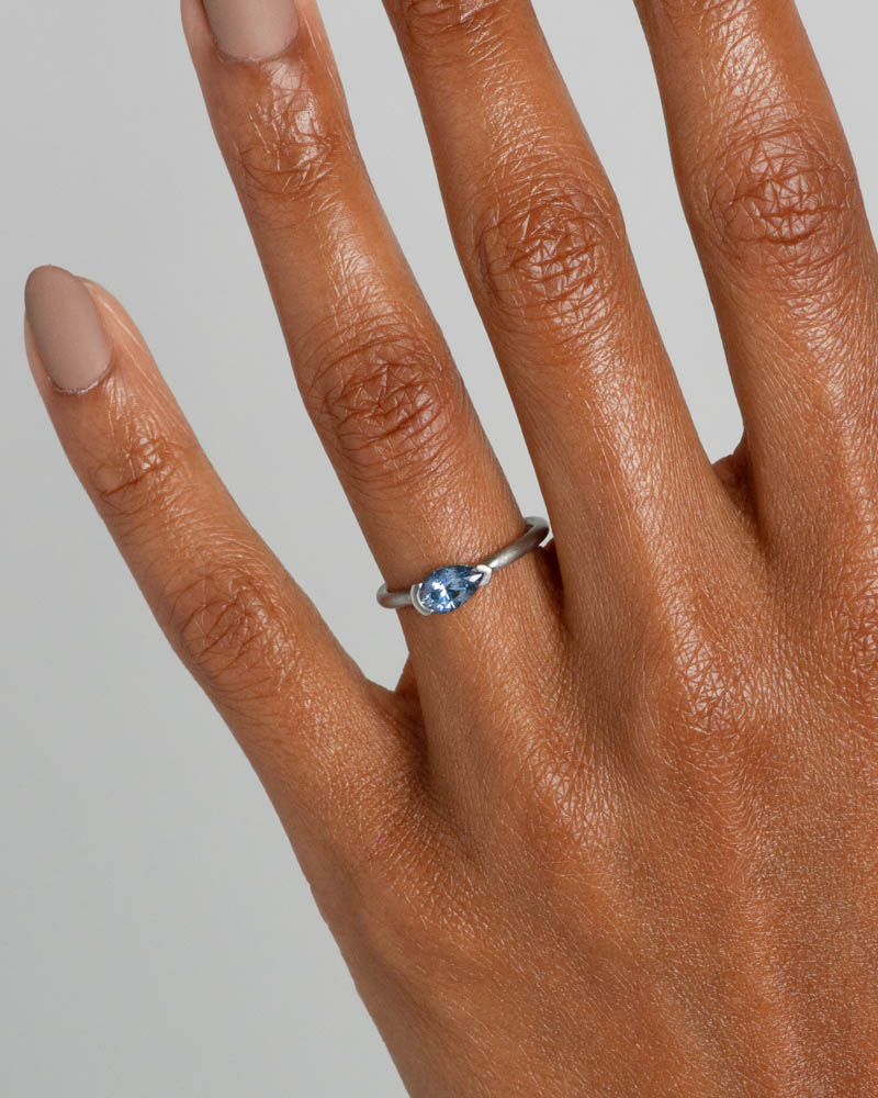 Nikko Sky Blue Sapphire Pear Ring on figure