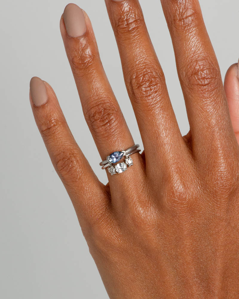 Nikko Sky Blue Sapphire Pear Ring with Icon Hex Diamond Oval Ring on figure