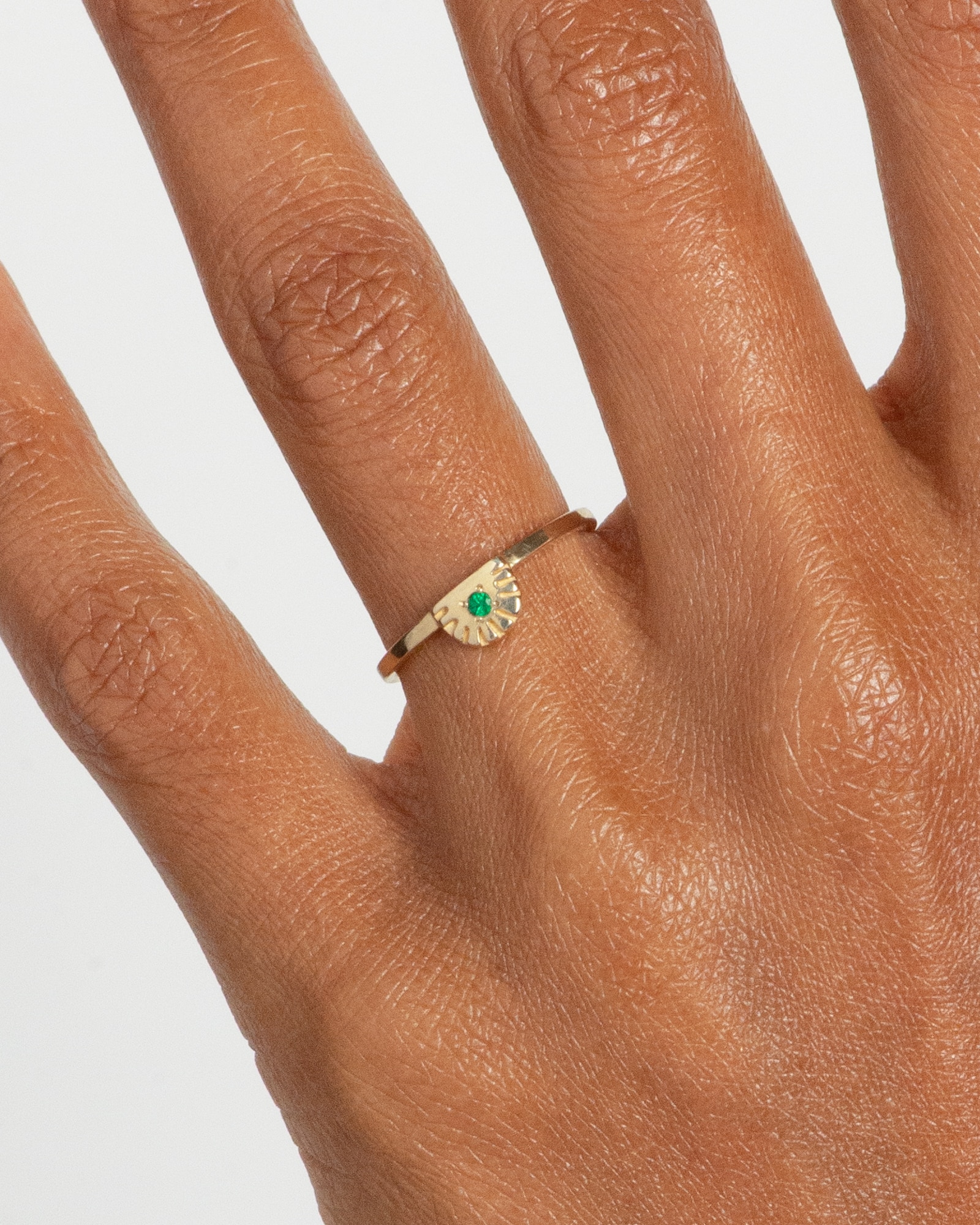 Ray Fringe Emerald Ring on figure