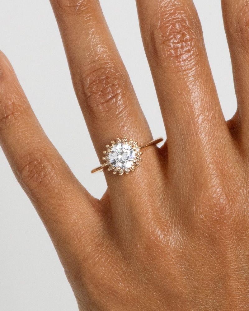Stellium Diamond with Champagne Halo Ring on figure