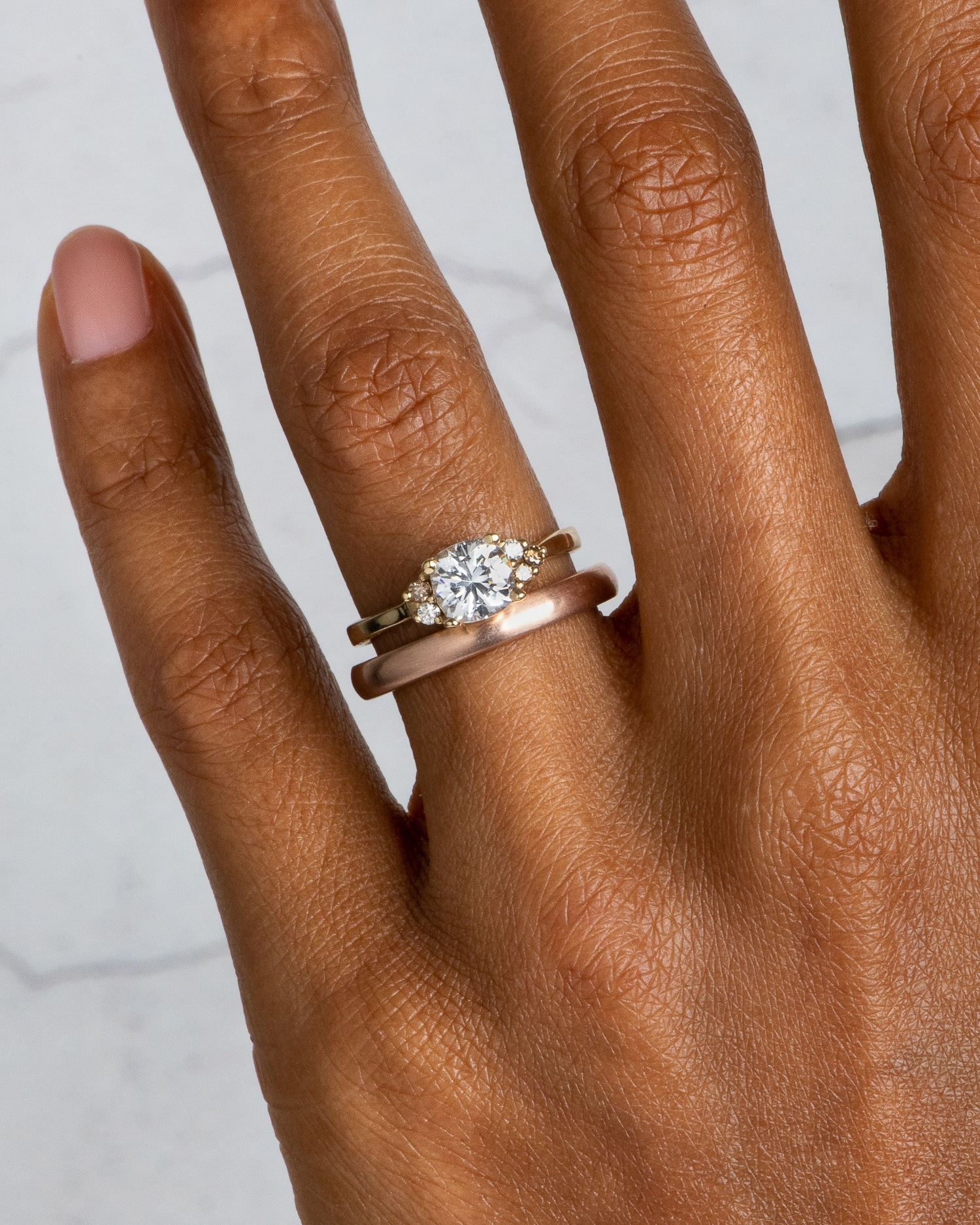 avens_asymmetrical_diamond_cushion_with_champagne_ombre_ring_and_milla_round_comfort_narrow_band_dsc4543_web2_4.jpg