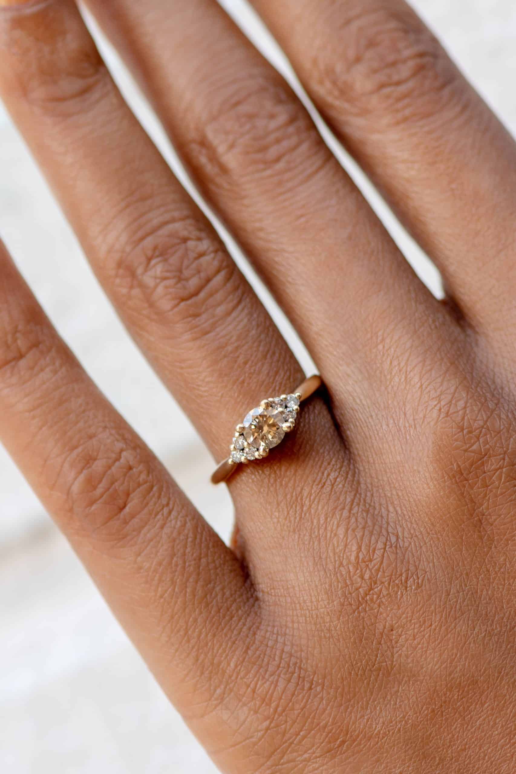 avens_symmetrical_round_champagne_diamond_ring_on_fig-0583_crop_1.jpg