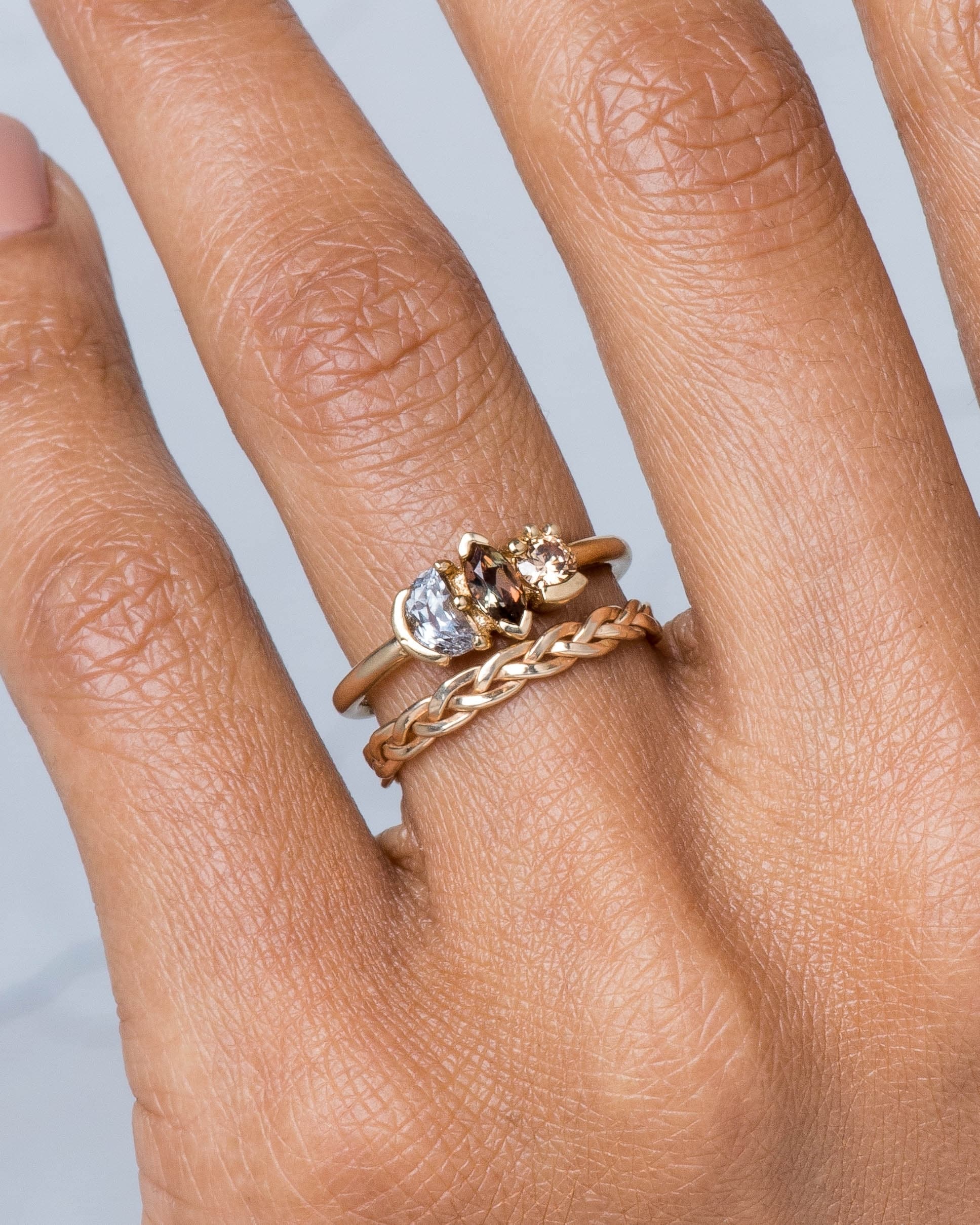 Aldine Thin Band and Lash Cluster Triad Andalusite Marquise Ring on figure
