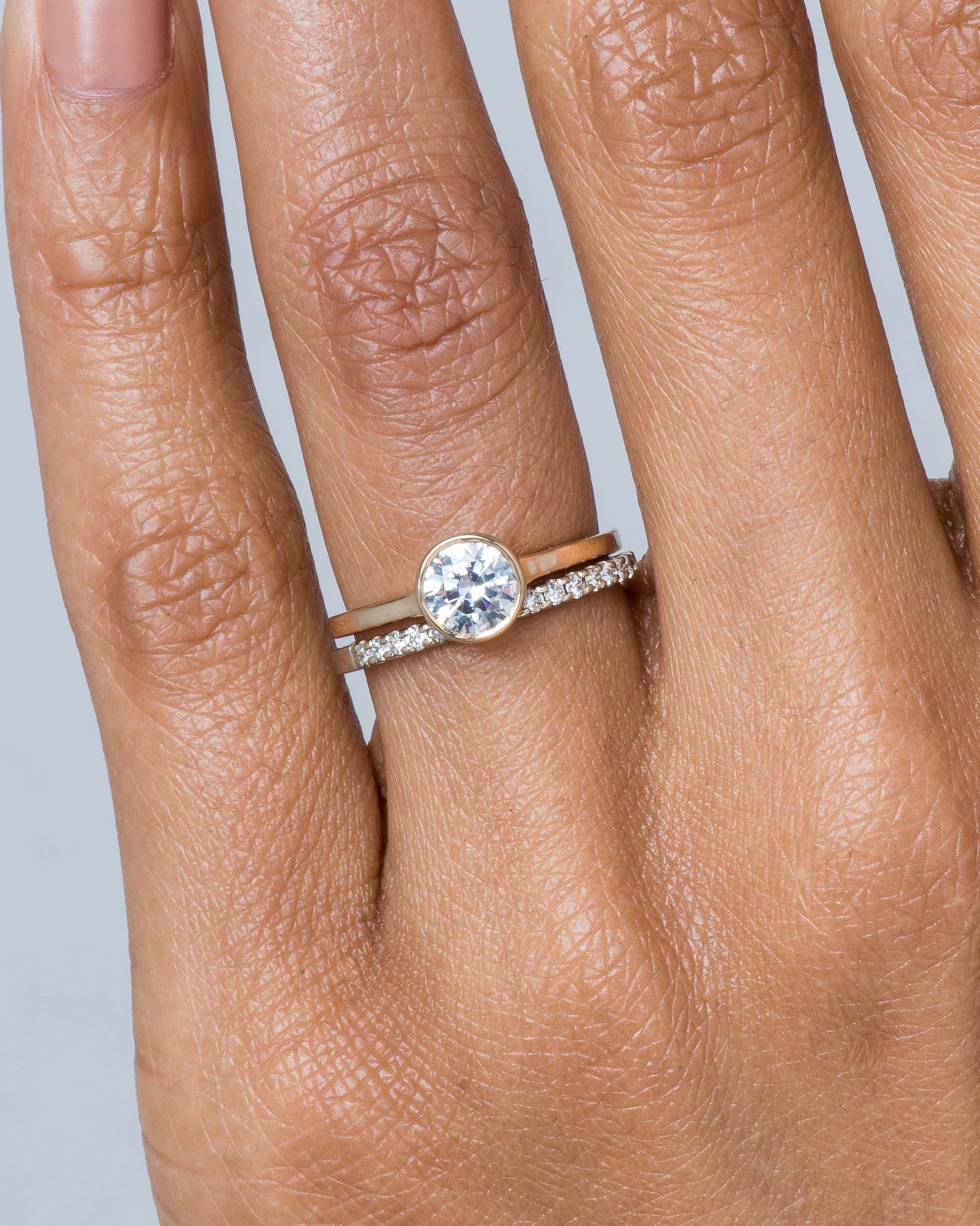 Eternity Half Diamond Band and Allium Diamond Ring with Notch .75ct on figure