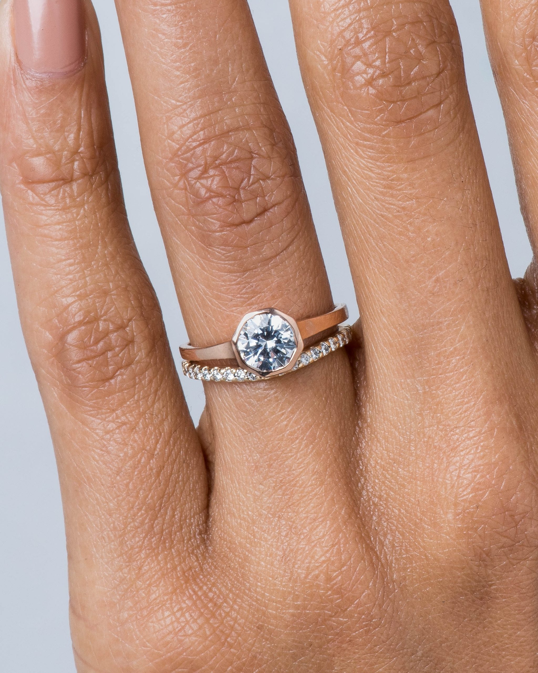 Allium Octad Diamond Ring and Eternity Half Curved Diamond Band on figure