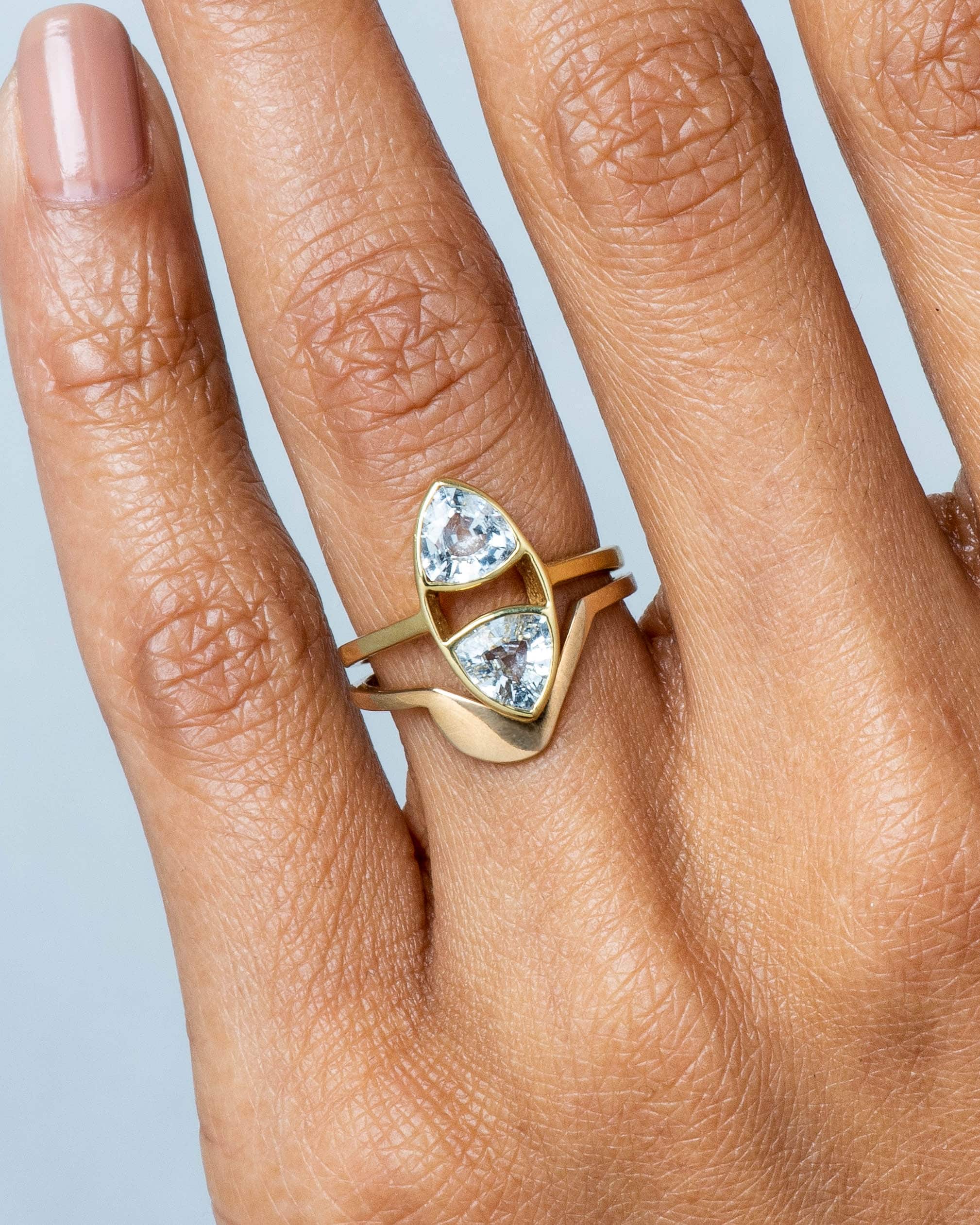 Trillion Dyad White Sapphire Ring and Icon Band on figure