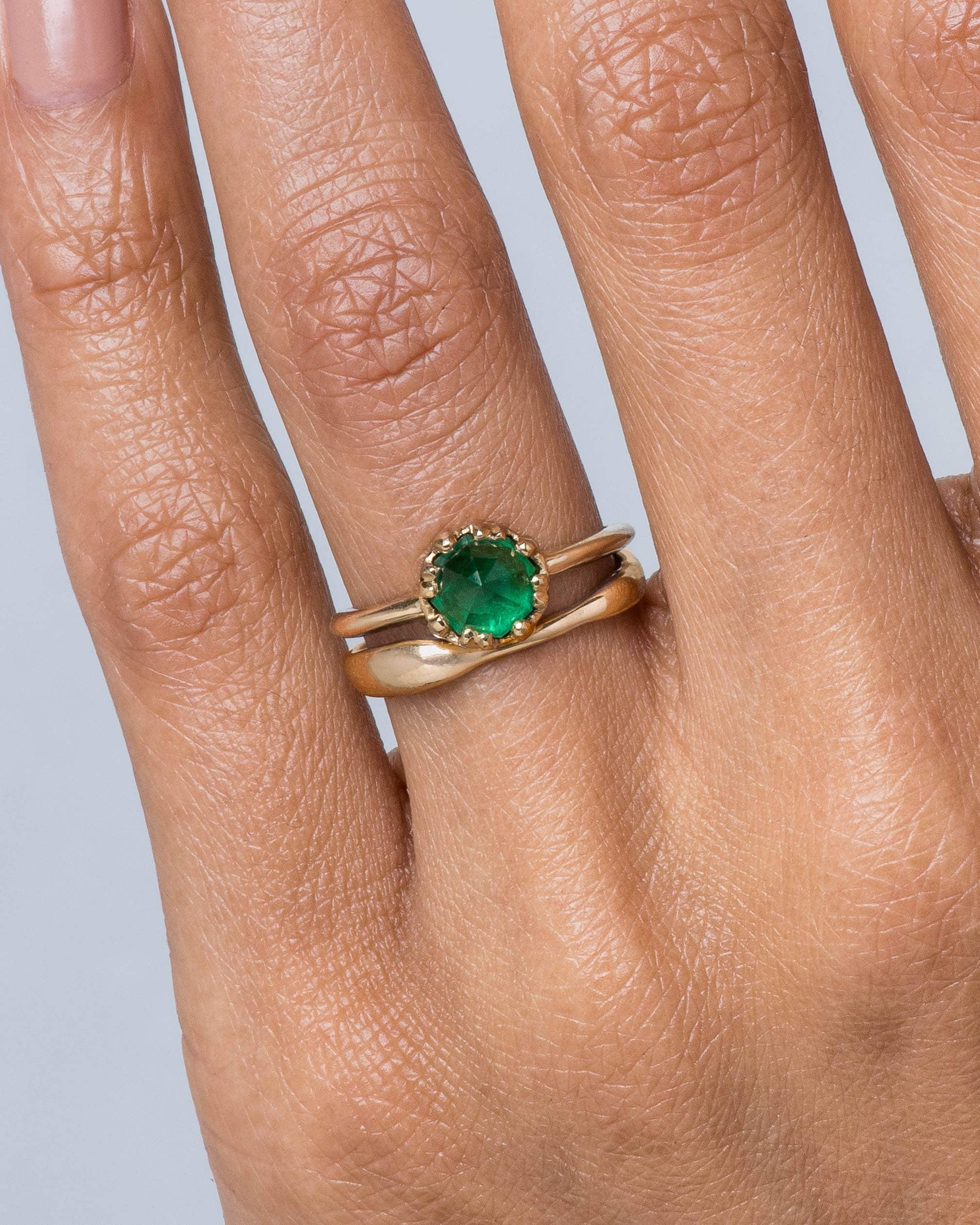 Sol Emerald Octagonal Ring and Reticulated One Band on figure