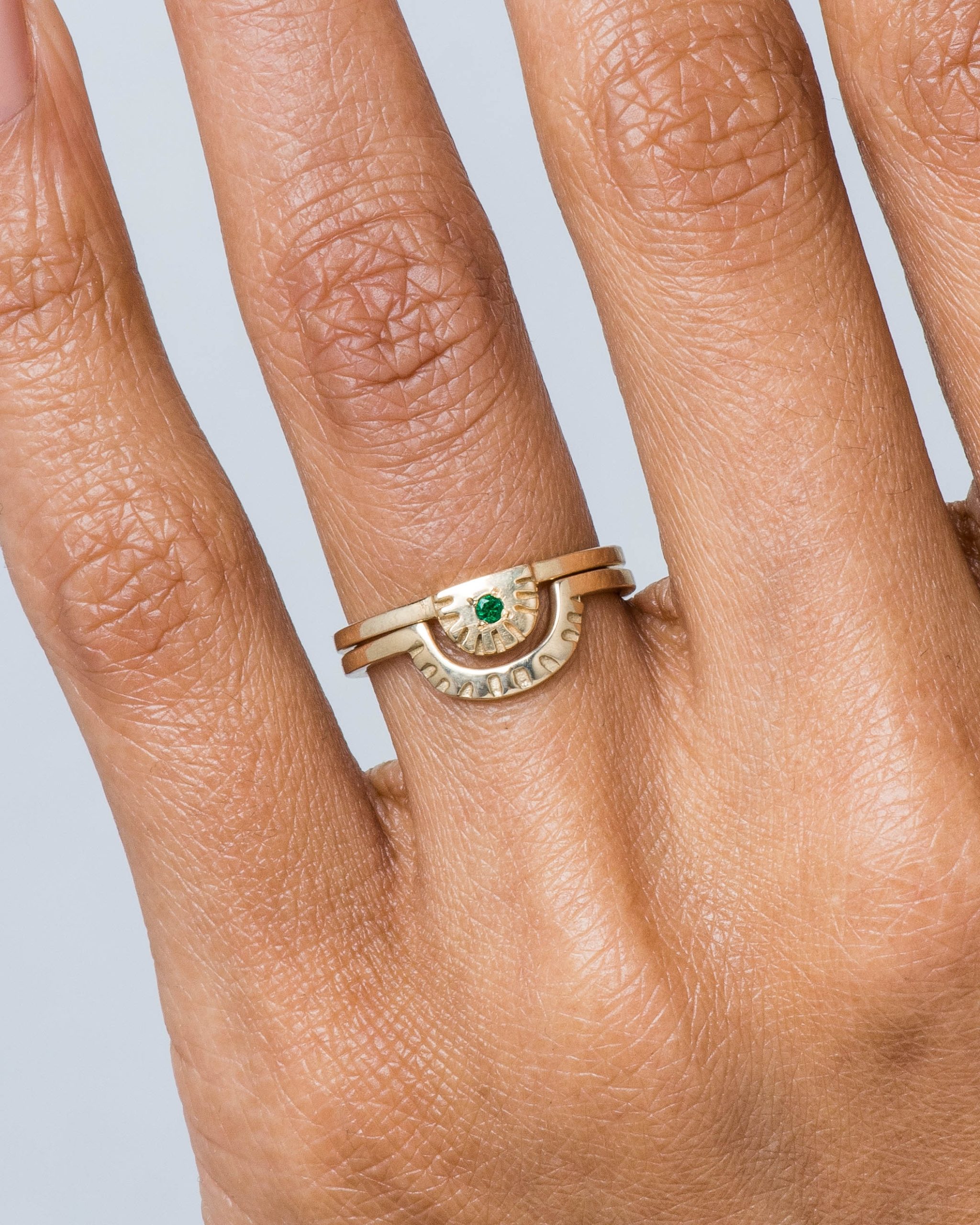 Ray Fringe Emerald Ring and Ray Fringe Band on figure