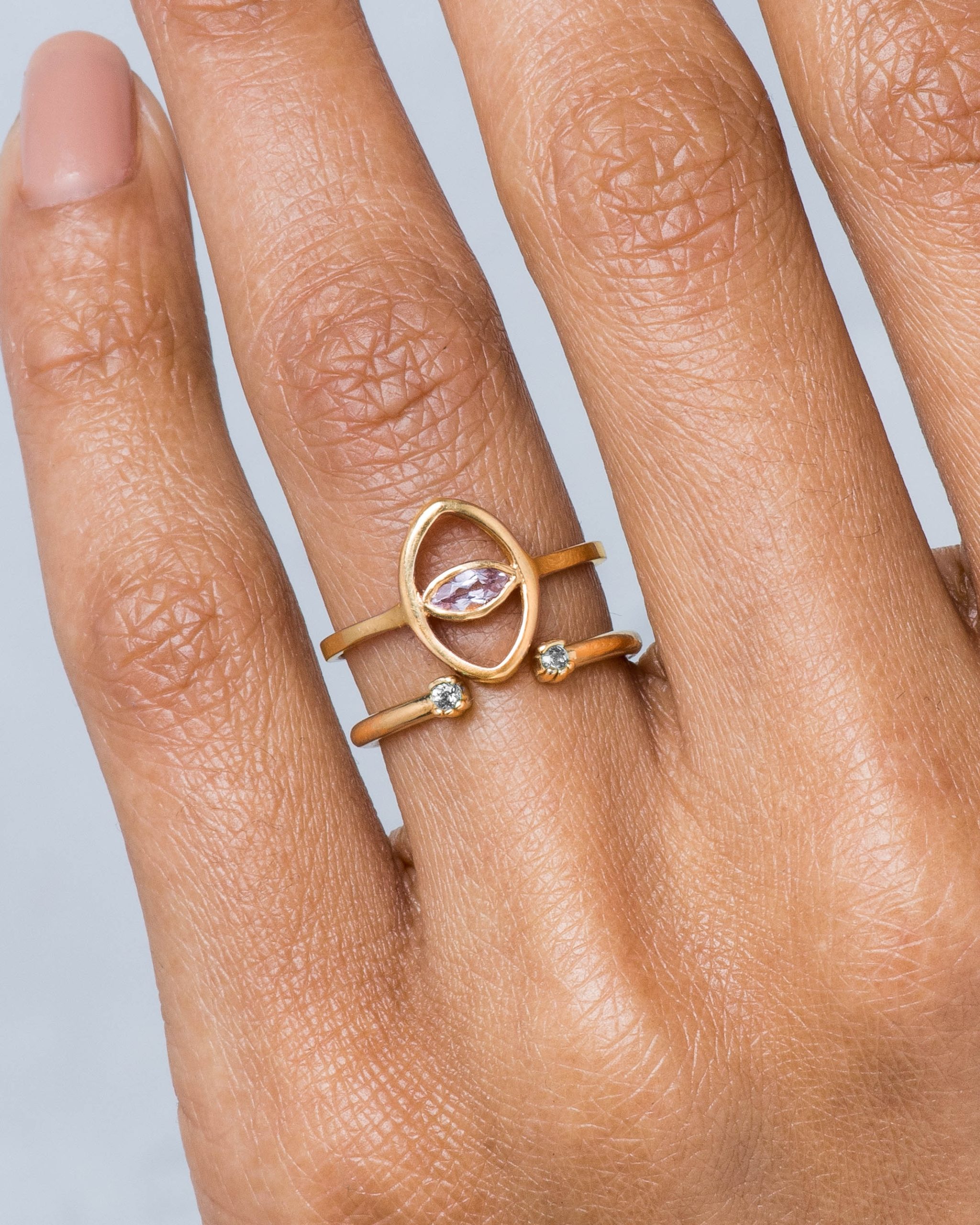 Aira Oko Morganite Marquise Ring with Open Lash Mini Diamond Ring on figure