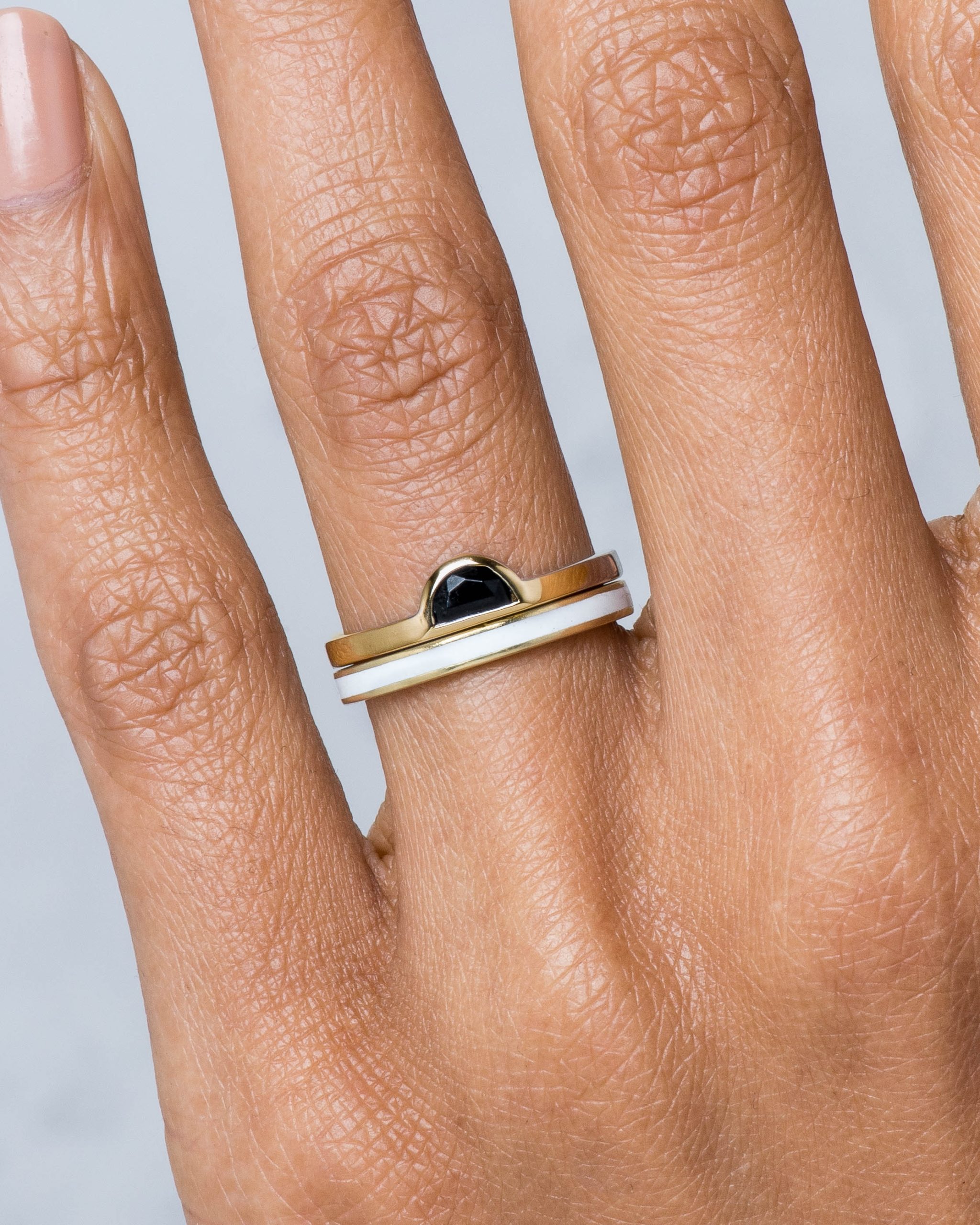 Senna Narrow Band with White Enamel and Half Moon Black Jade Ring on figure