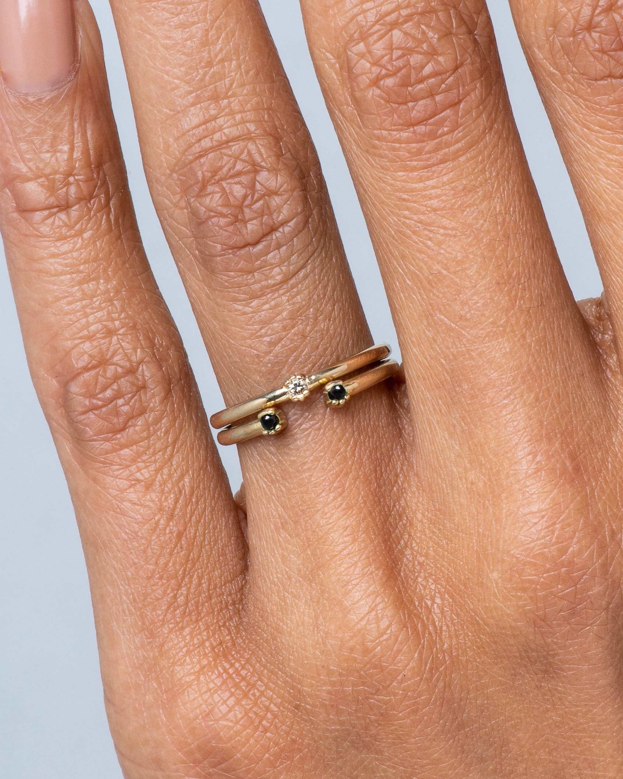 Lash Mini Champagne Diamond Ring and Open Lash Mini Black Diamond Ring on figure