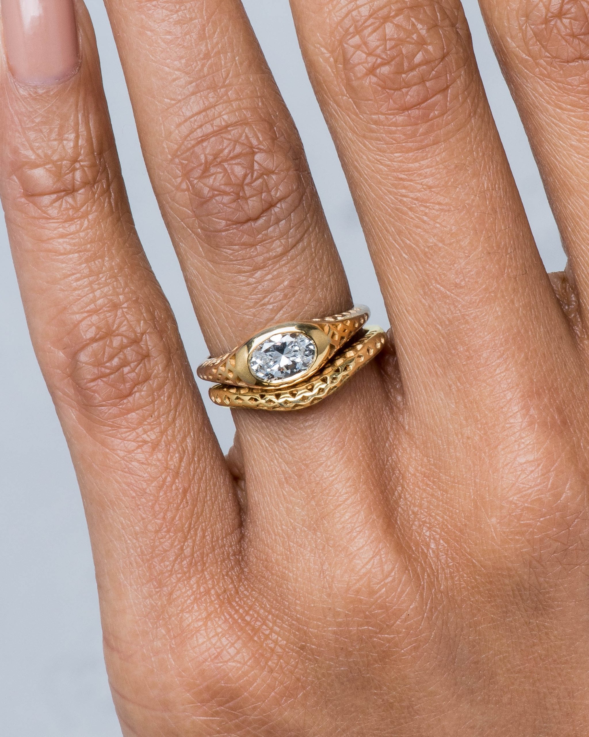 Filigree Diamond Oval Ring and Filigree Curved Band on figure