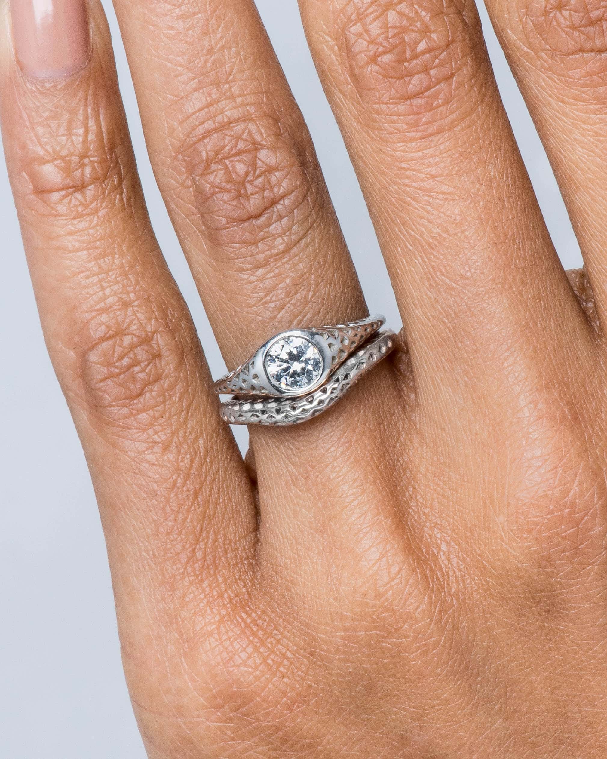 Filigree Diamond Ring and Filigree Curved Band on figure
