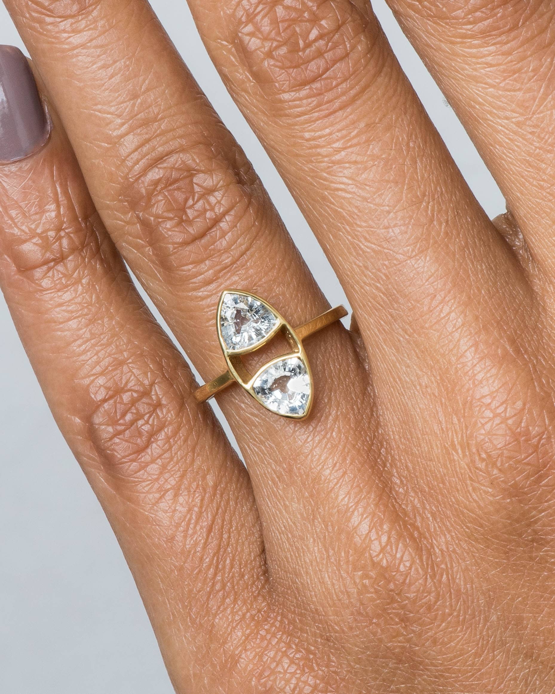 Trillion Dyad White Sapphire Ring on figure