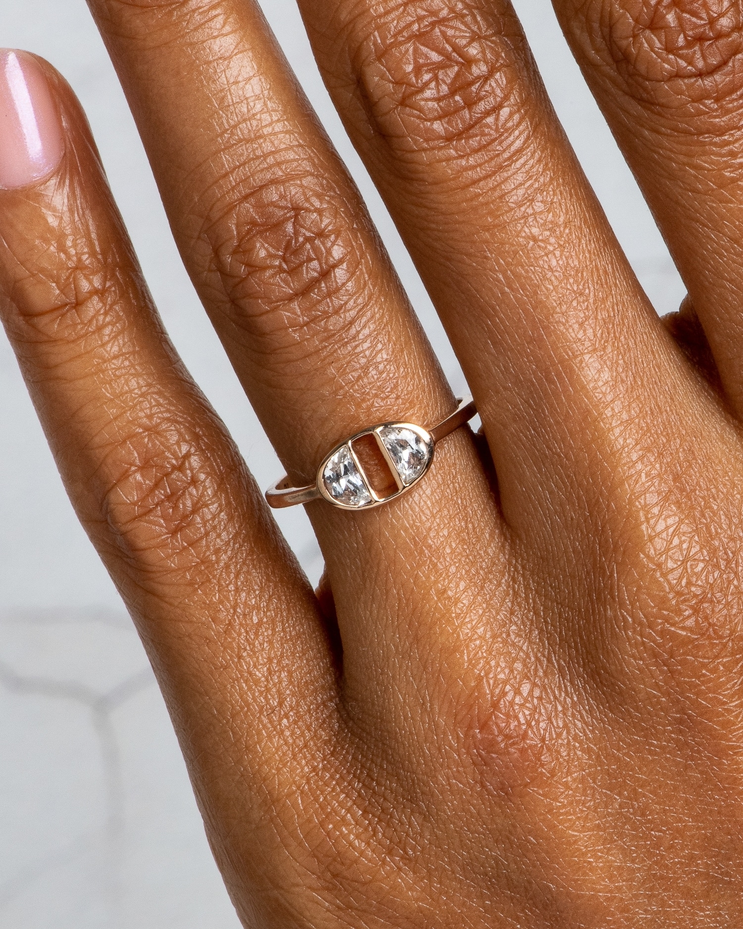 Half-Moon Dyad White Sapphire Ring on figure