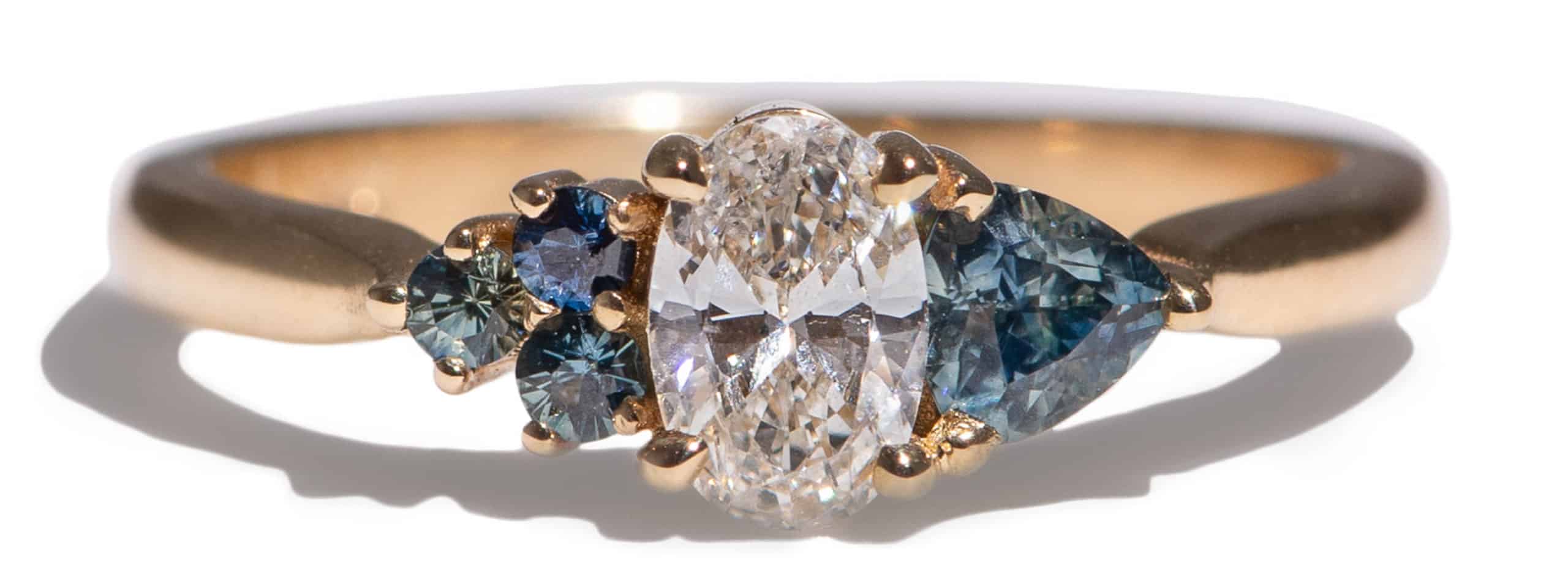 Custom Oval Cut Diamond and Blue Green Sapphire Cluster Ring