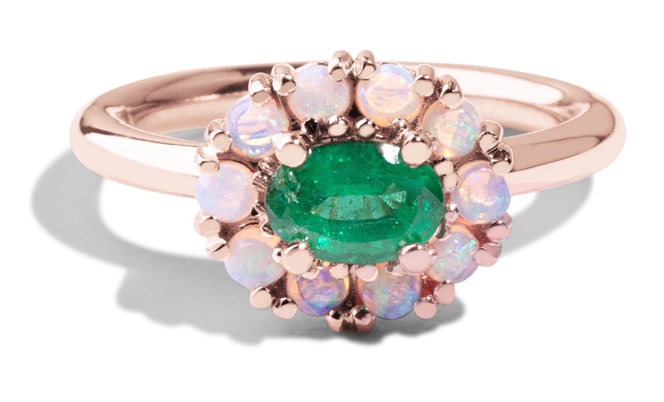 Custom Oval Cut Emerald and Opal Halo Ring