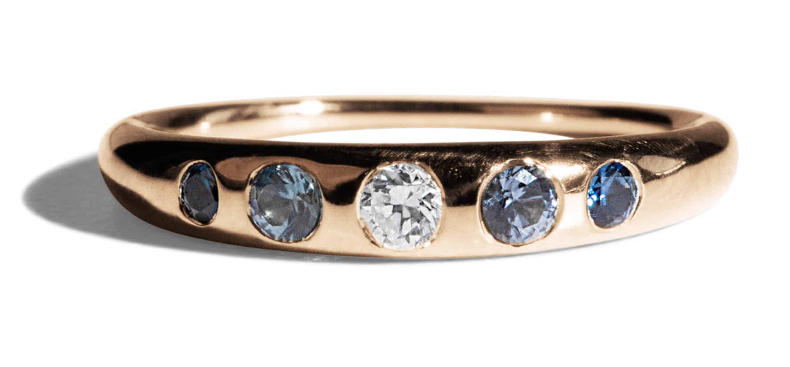 Custom Diamond and Light Blue Sapphire Crescent Band