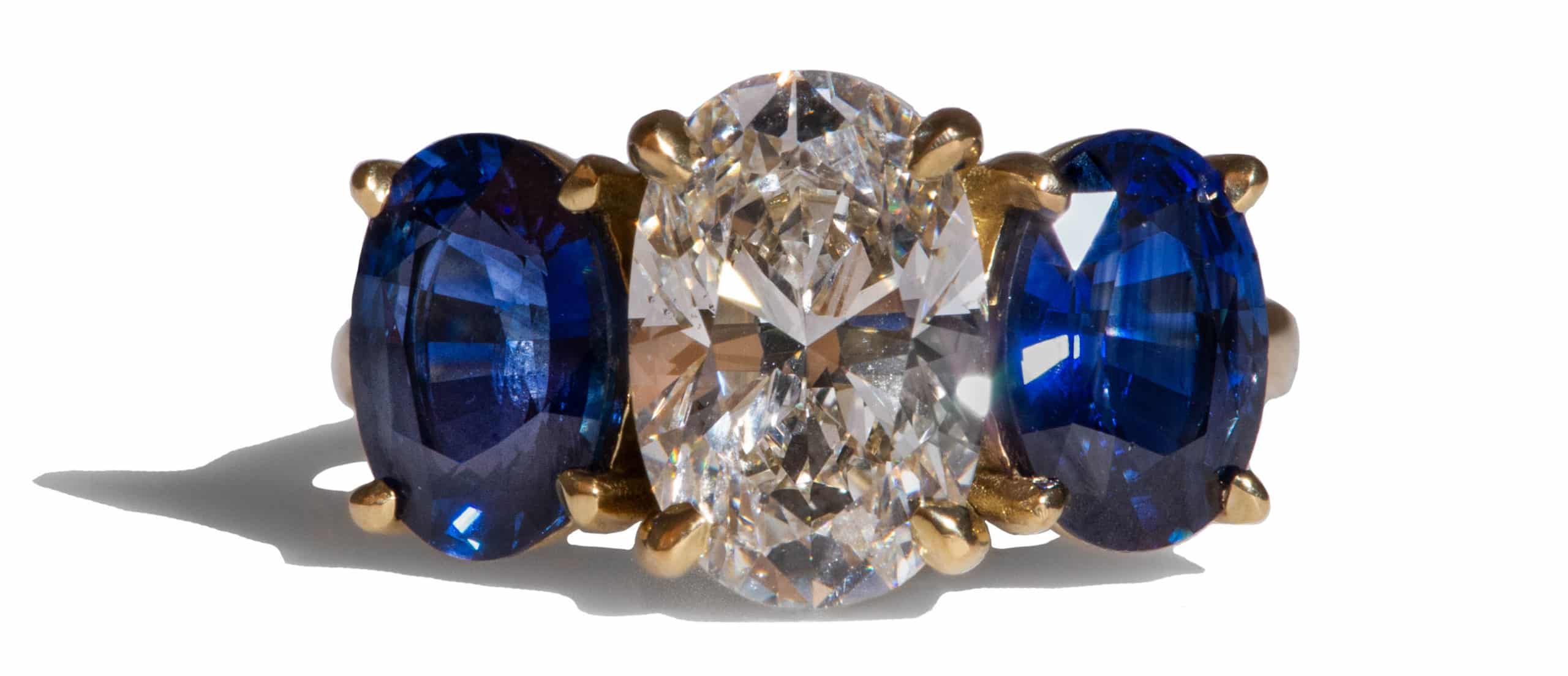 Custom Oval Cut Diamond and Blue Sapphire Triad Ring
