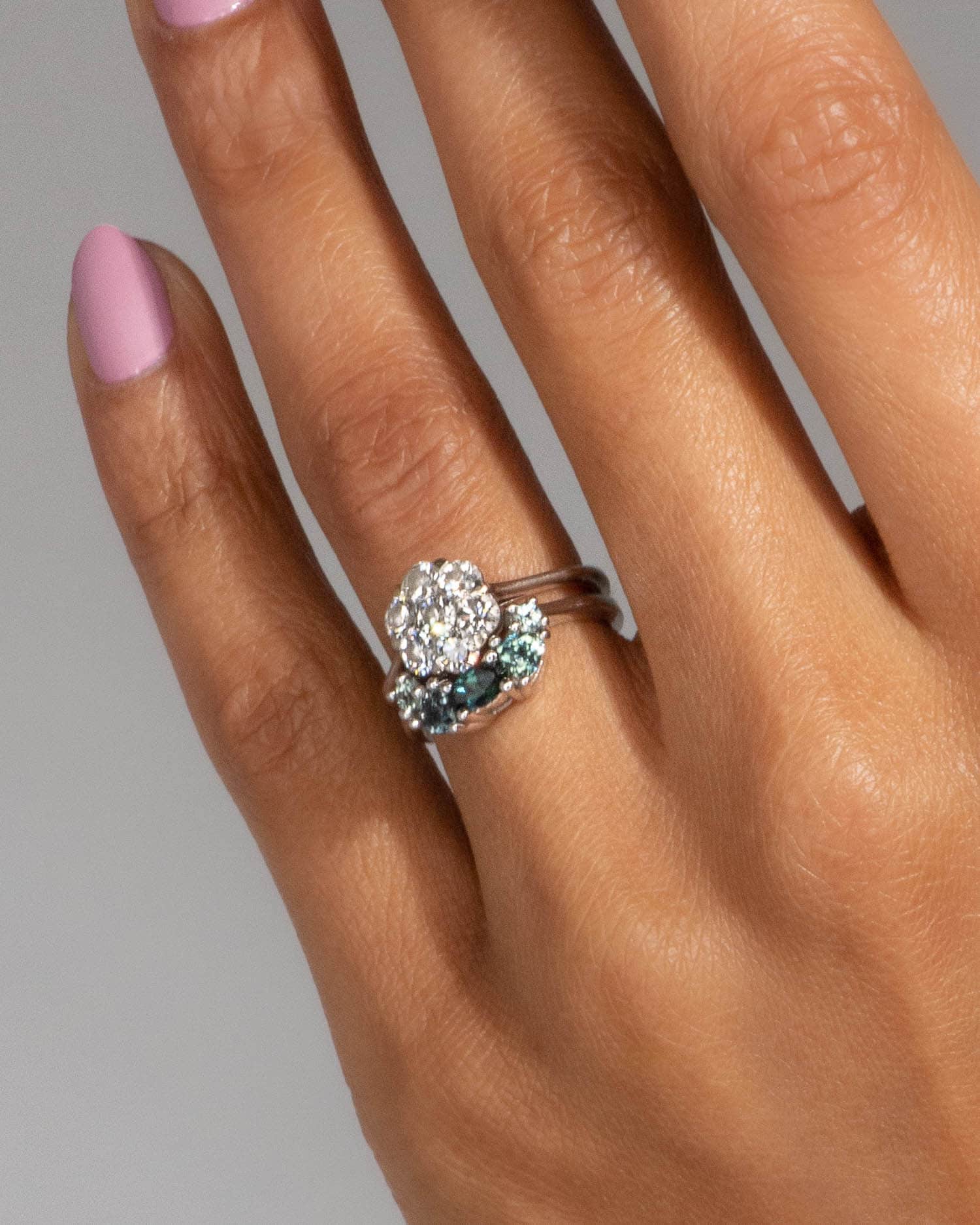 cust_heirloom_curved_oval_trillion_sapphire_band_wagner_plat_2_web2_1.jpg