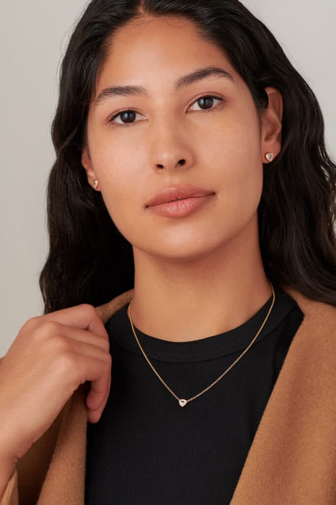 Trillion White Sapphire Pendant and Trillion White Sapphire Studs on figure