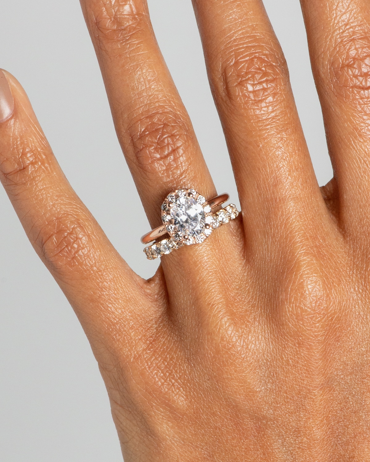 Dez Diamond Oval Halo Ring 1.5ct and Dez Half Eternity Round Diamond Band 3mm on figure