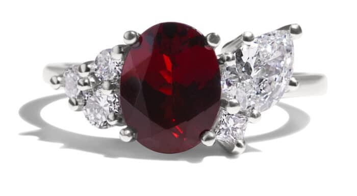 Custom Oval Cut Garnet and Diamond Cluster Ring in Platinum