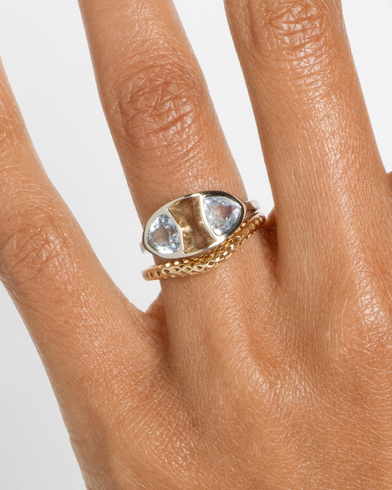 Trillion Dyad Ellipse White Sapphire Ring with Filigree Band on figure
