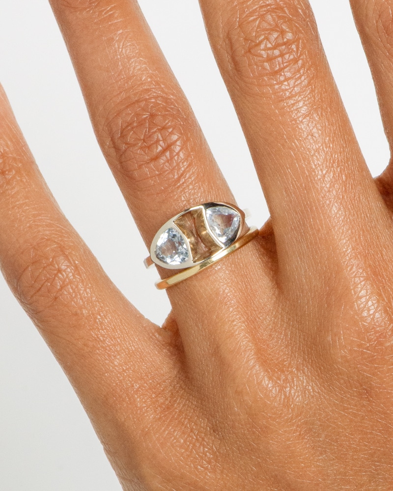 Trillion Dyad Ellipse White Sapphire Ring with Milla Thin Band on figure