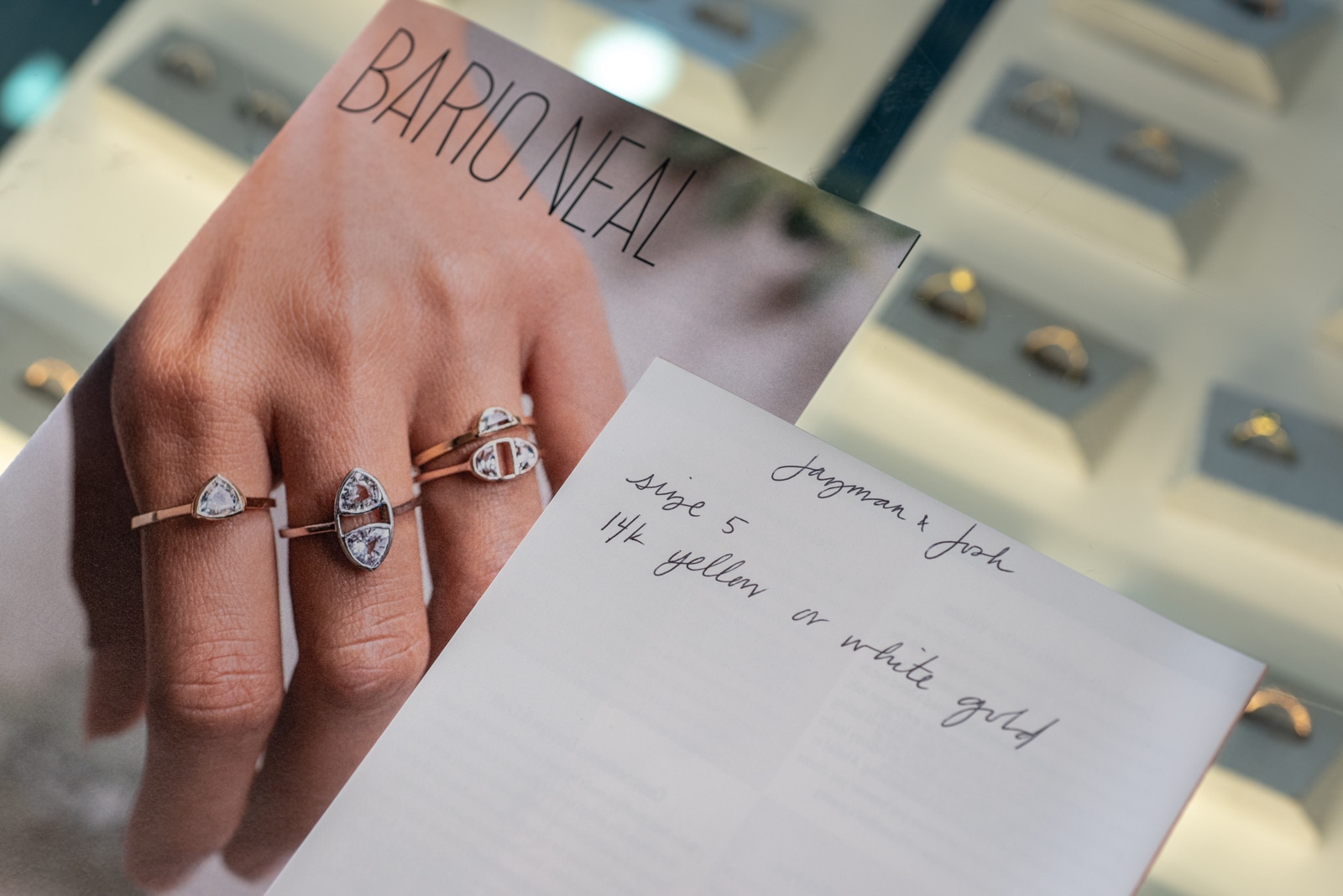 Photograph of a Bario Neal card and notepad with a client's ring size