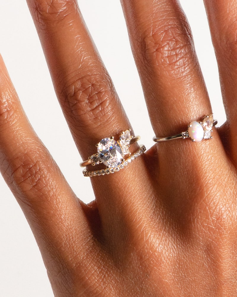 Eaves Cluster Diamond Ring 1.5ct, Eternity Curved Narrow Diamond Band, and Eaves Cluster Opal with Morganite Ring on figure