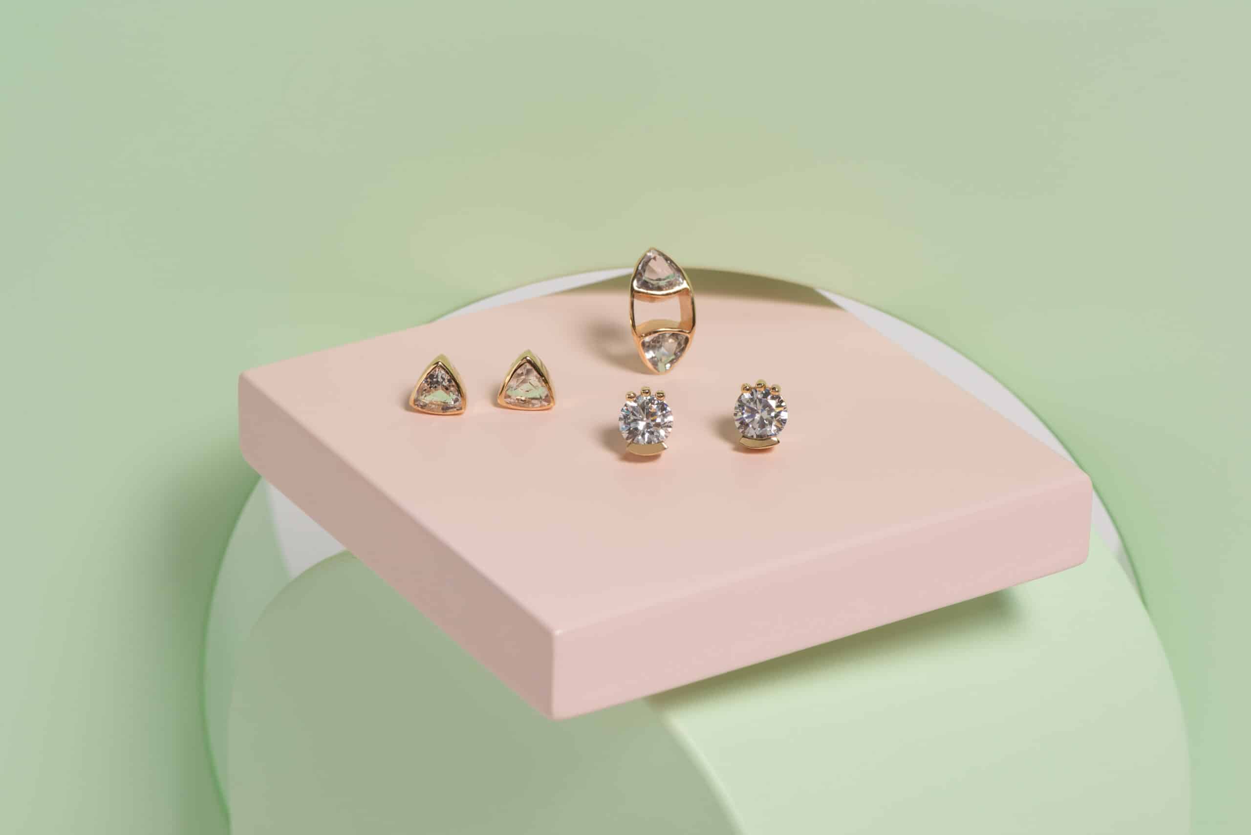 Pink box with earrings and ring.