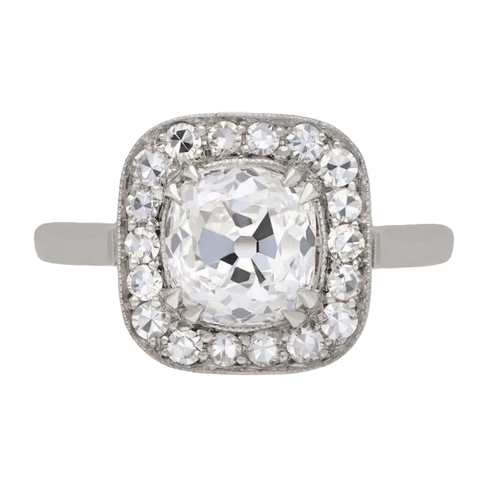 Old Mine Diamond Coronet Cluster Ring, circa 1920
The total approximate diamond weight is 2.46 carats, to an impressive coronet cluster design featuring curving double claws and millegrain edging, an intricately pierced gallery and fancy shape open backholing, leading to raised shoulders and flowing through to a solid D-shape shank. Marked platinum, circa 1920, accompanied by Gemological Institute of America (GIA) #6422622637.