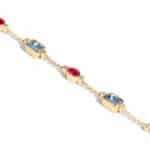 Custom Blue Topaz, Ruby, and Diamond Bracelet
