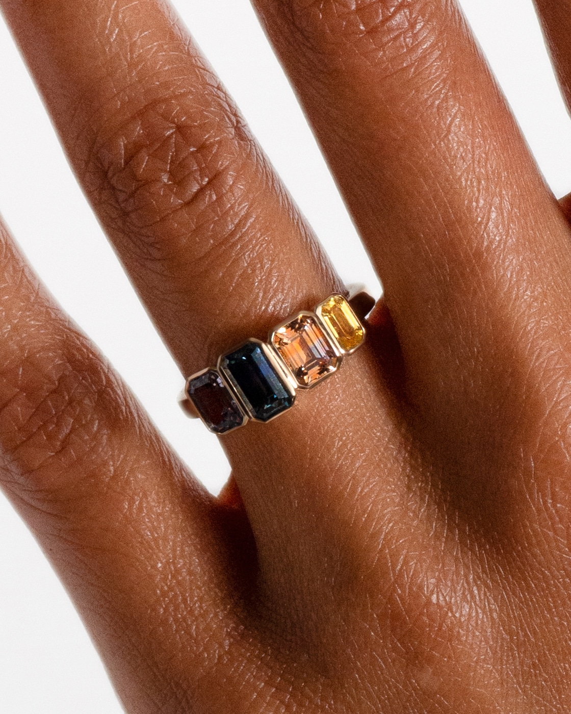 Linear Emerald Cut Sapphire Ring_On Figure_Solo_WEB2