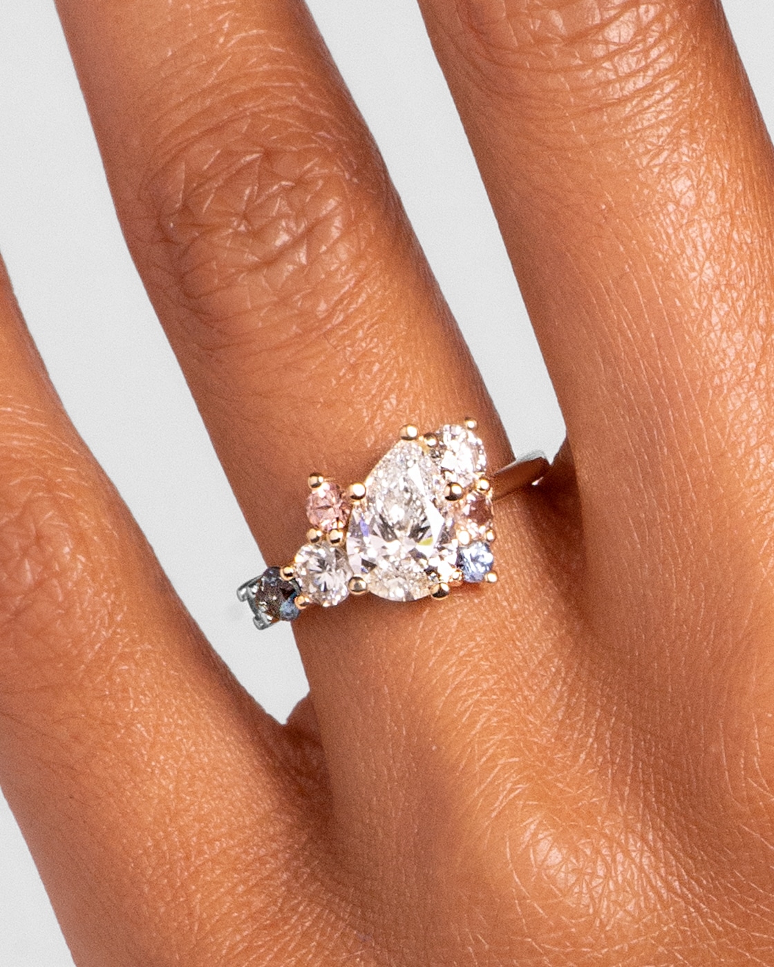 Custom Pear Cut Diamond and Sky Blue Cluster Ring
