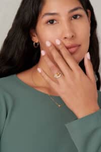 Fusion Shield Cut Diamond and Apricot Sapphire Ring and Fusion Diamond Band on Figure
