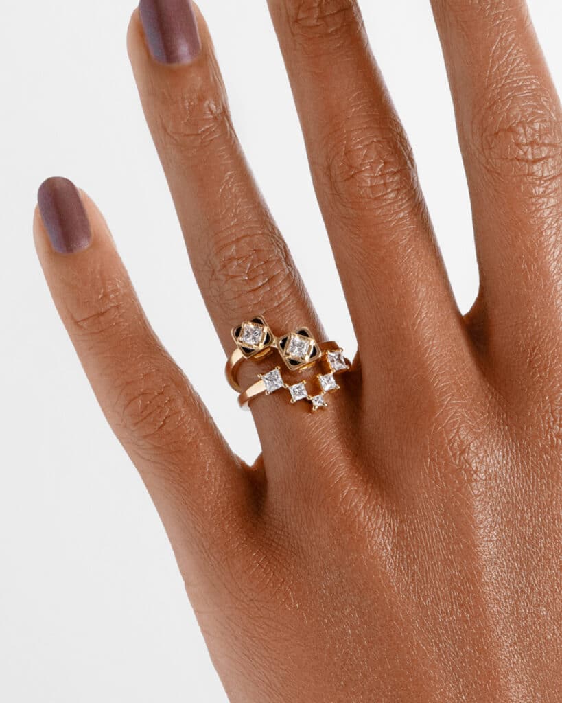 Cascading Princess Cut Diamond Band with Senna Diamond Toi et Moi Black Enamel Ring on figure