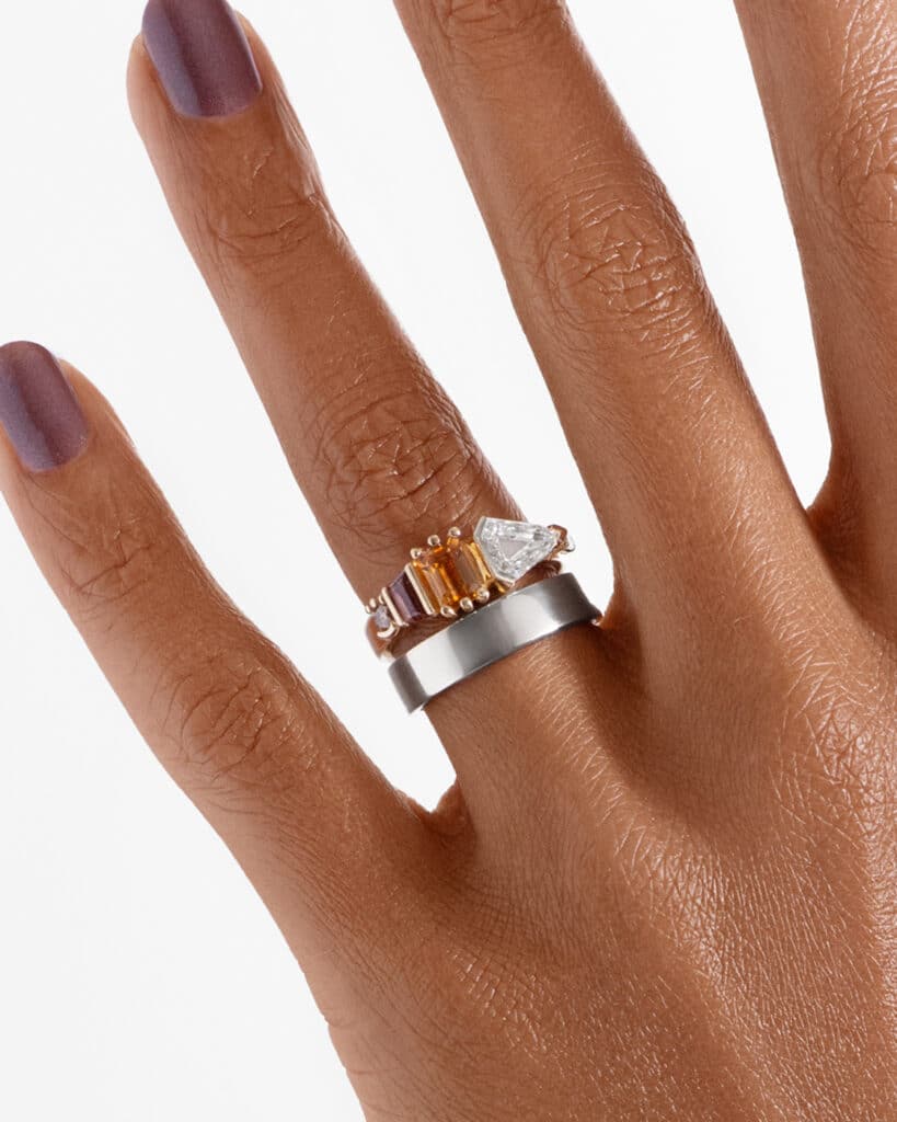 Fusion Shield Cut Diamond and Apricot Sapphire Ring_with_Milla Square Wide Band 5mm 14W_ECOMM_On Figure_WEB2