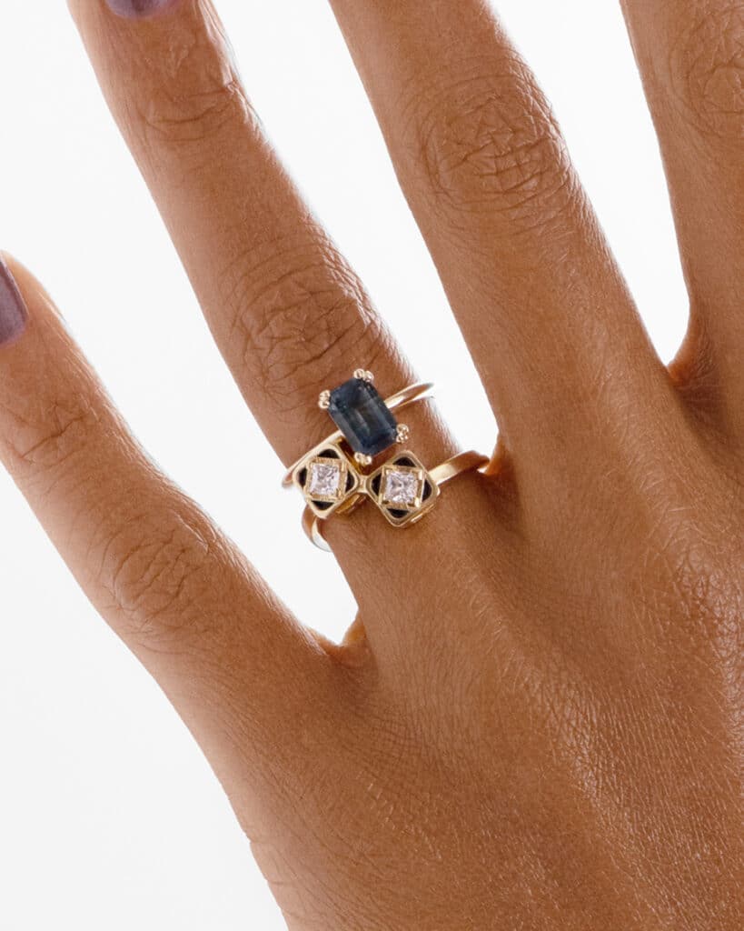 Senna Diamond Toi et Moi Black Enamel Ring with Ray Emerald Blue Green Sapphire Ring on figure