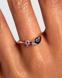 Custom Blue and Pink Sapphire Jacket Band on figure