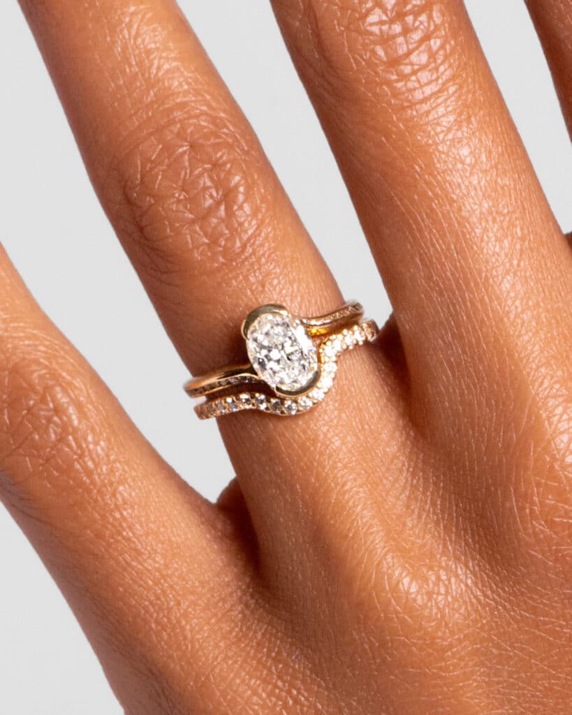 Custom Curved Diamond Band and Custom Diamond Bypass Ring on figure